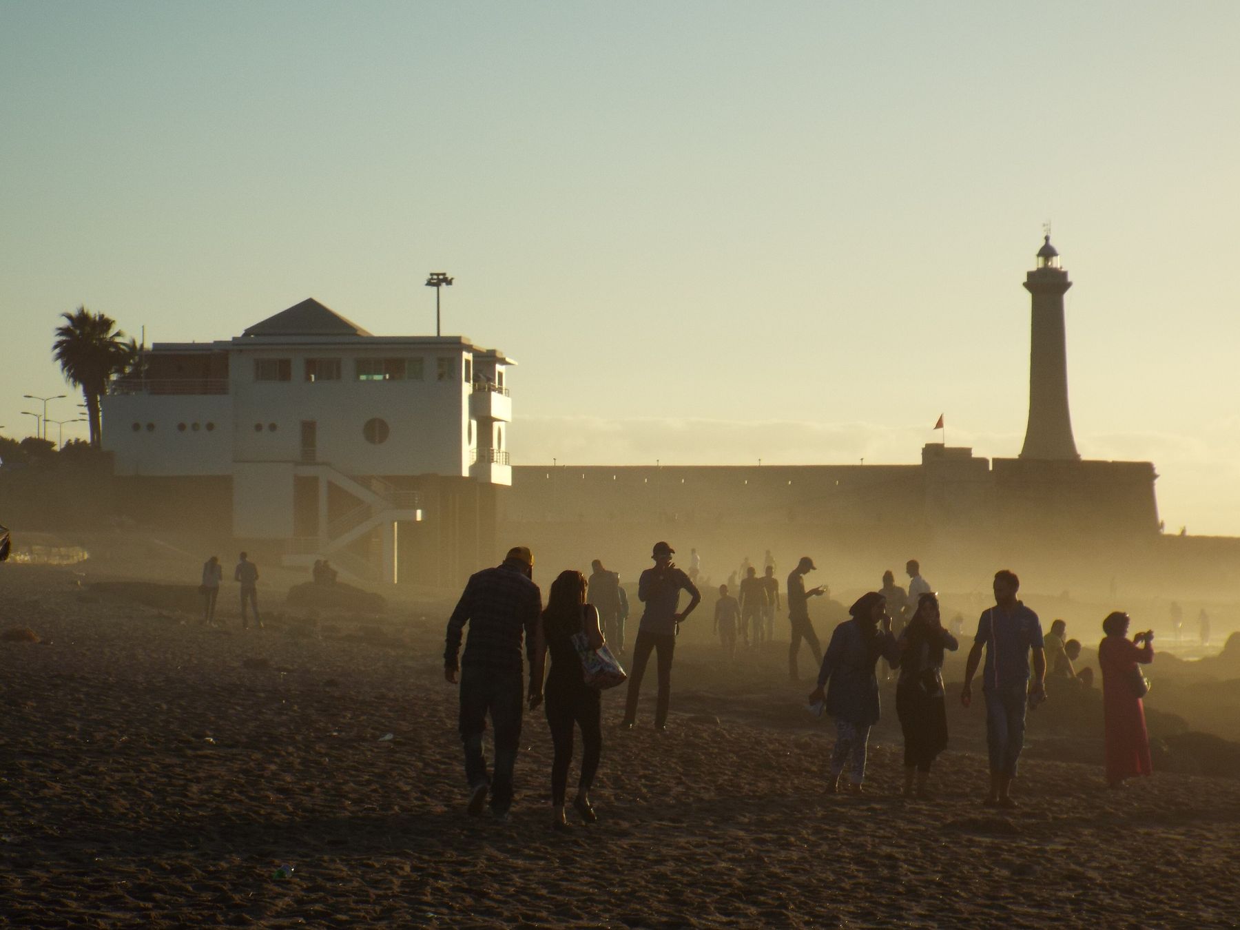 Rabat beach on the Atlantic at sunset, with the lighthouse behind